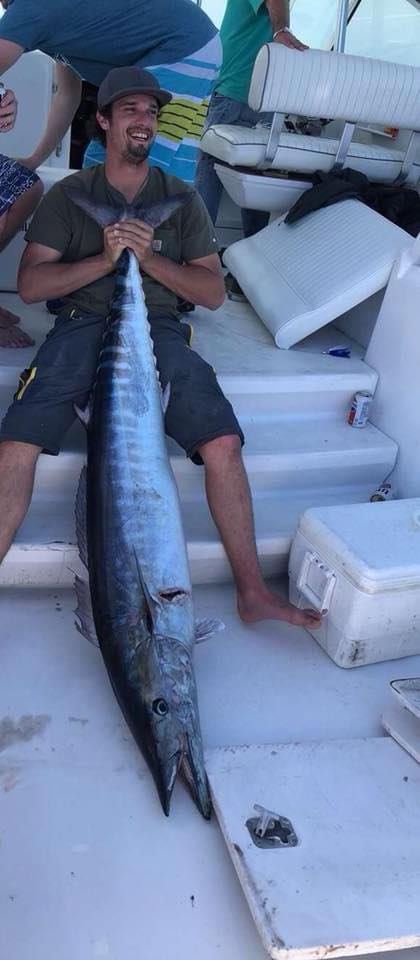 Large wahoo fish caught fishing at Wrightsville Beach NC displayed on boat deck