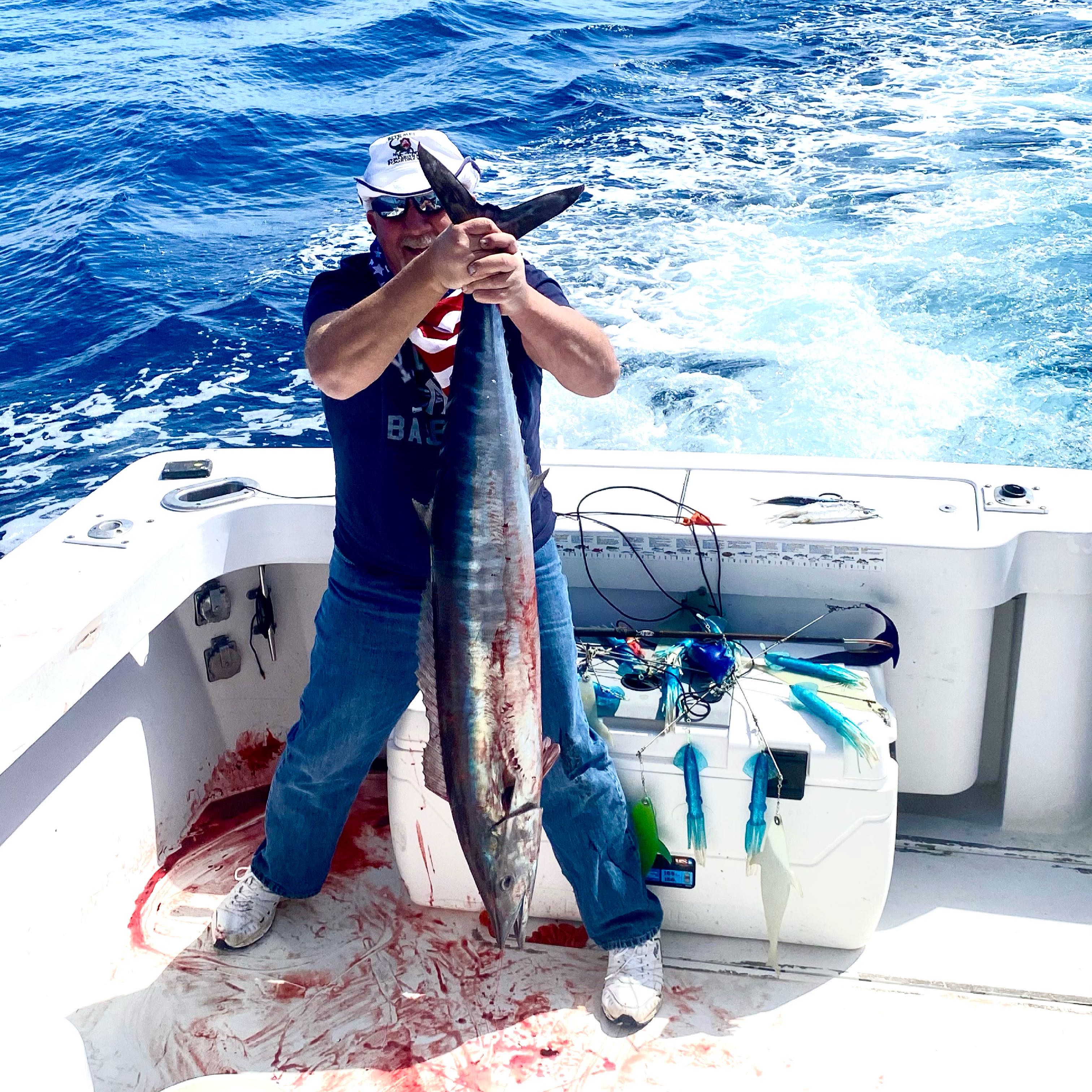 Fresh caught wahoo fish displayed on fishing boat deck at Wrightsville Beach NC