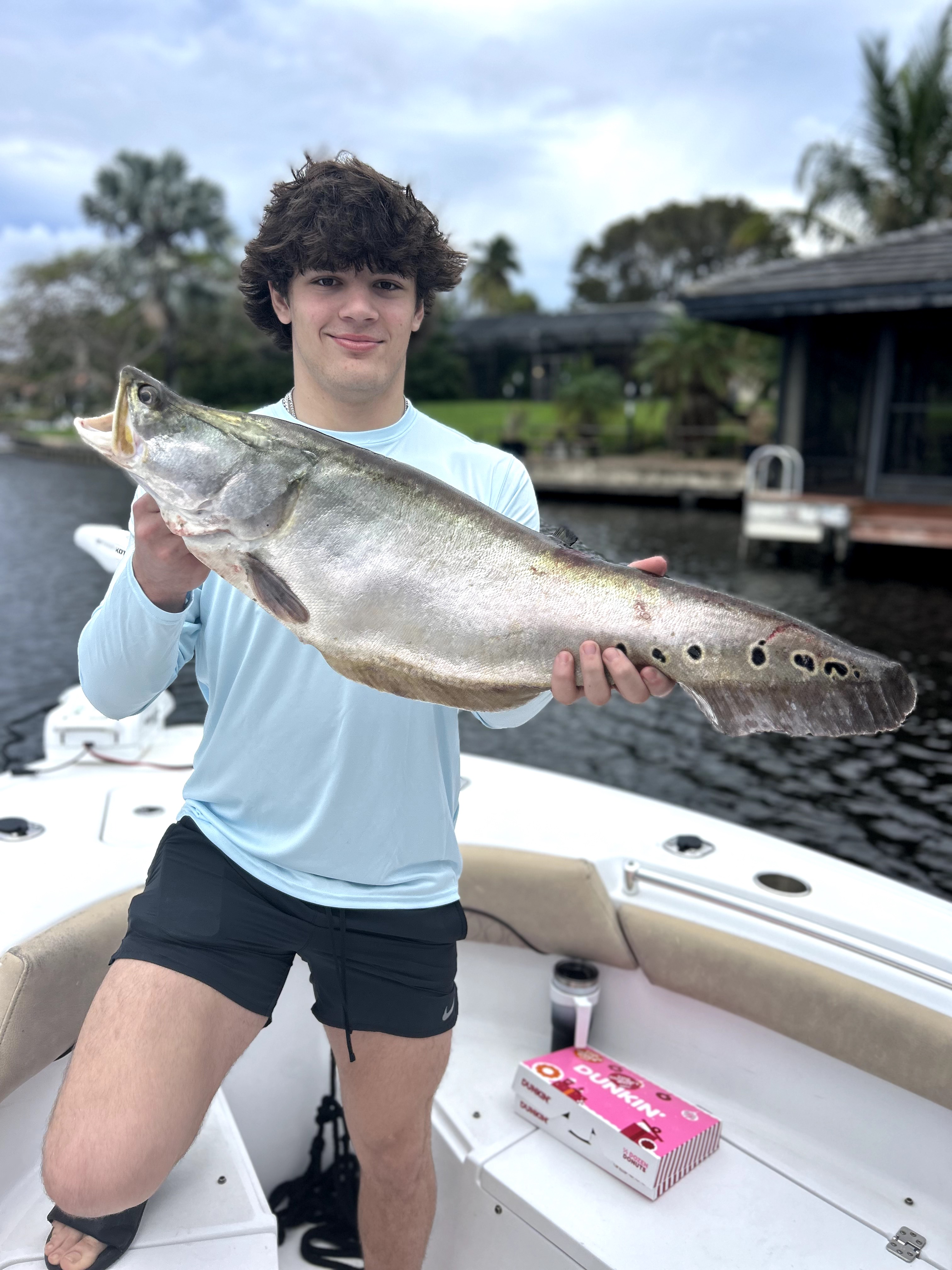 A person fishing at the beach in Delray Beach
