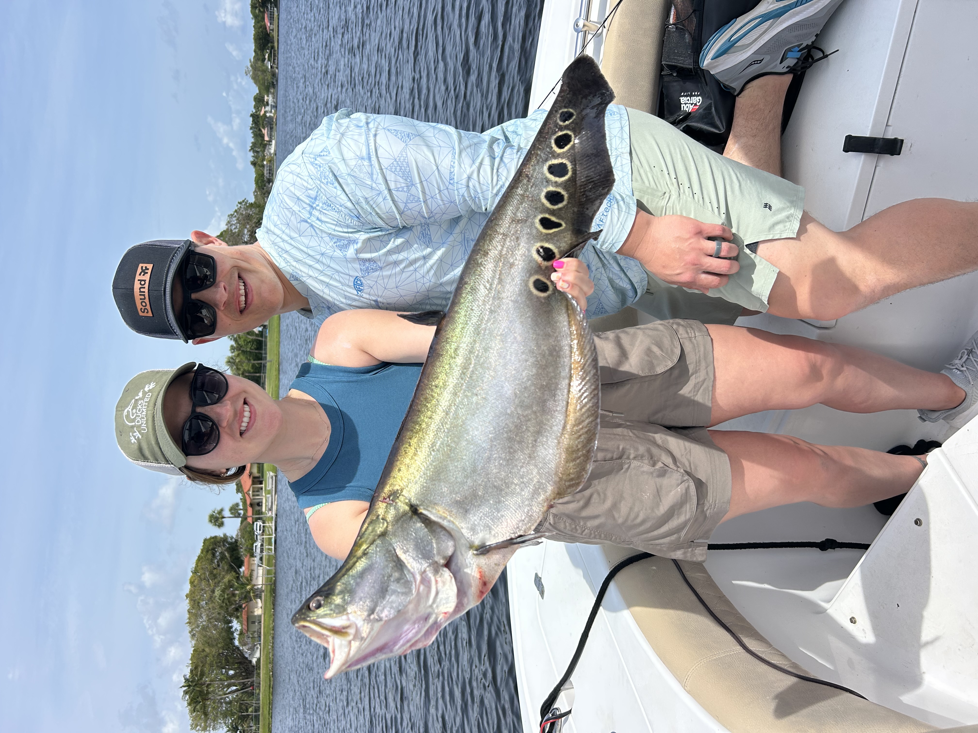 Two people fishing in FL