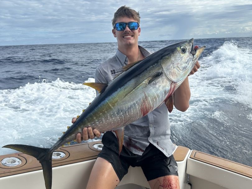 Quepos offshore fishing charter boat trolling for large pelagic fish at deep water FADs
