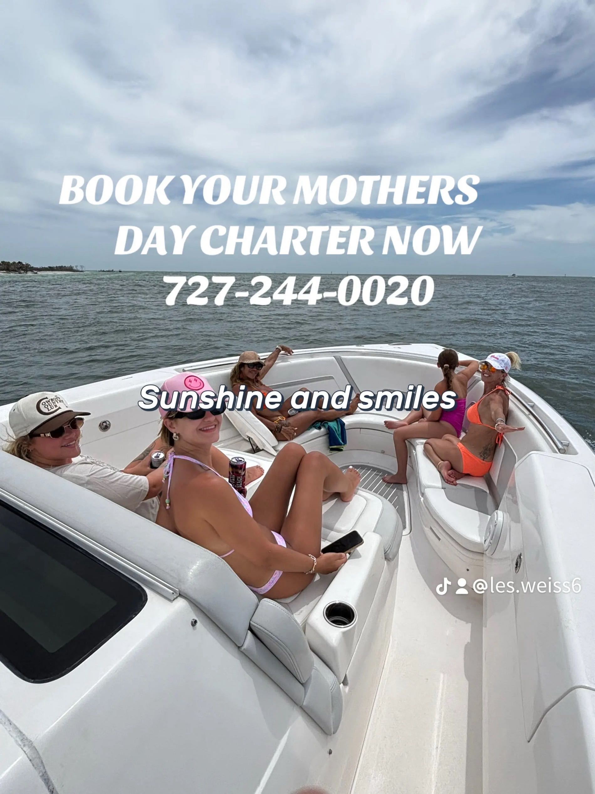 White boat with passengers relaxing on water in St. Petersburg FL during charter cruise