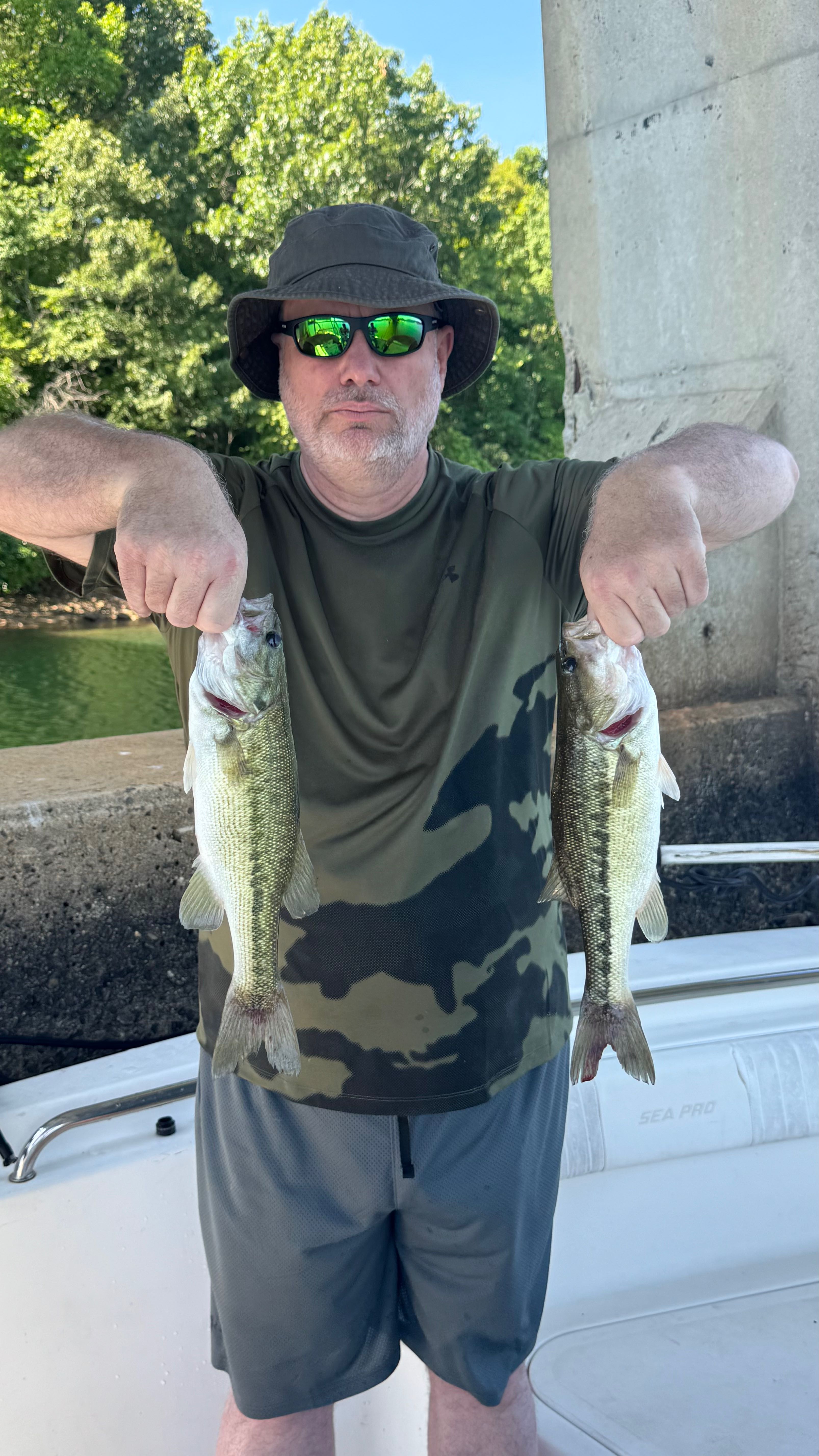 Two spotted bass caught during fishing trip in Denver NC