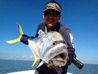 Angler holding a 19-inch fish in Galveston