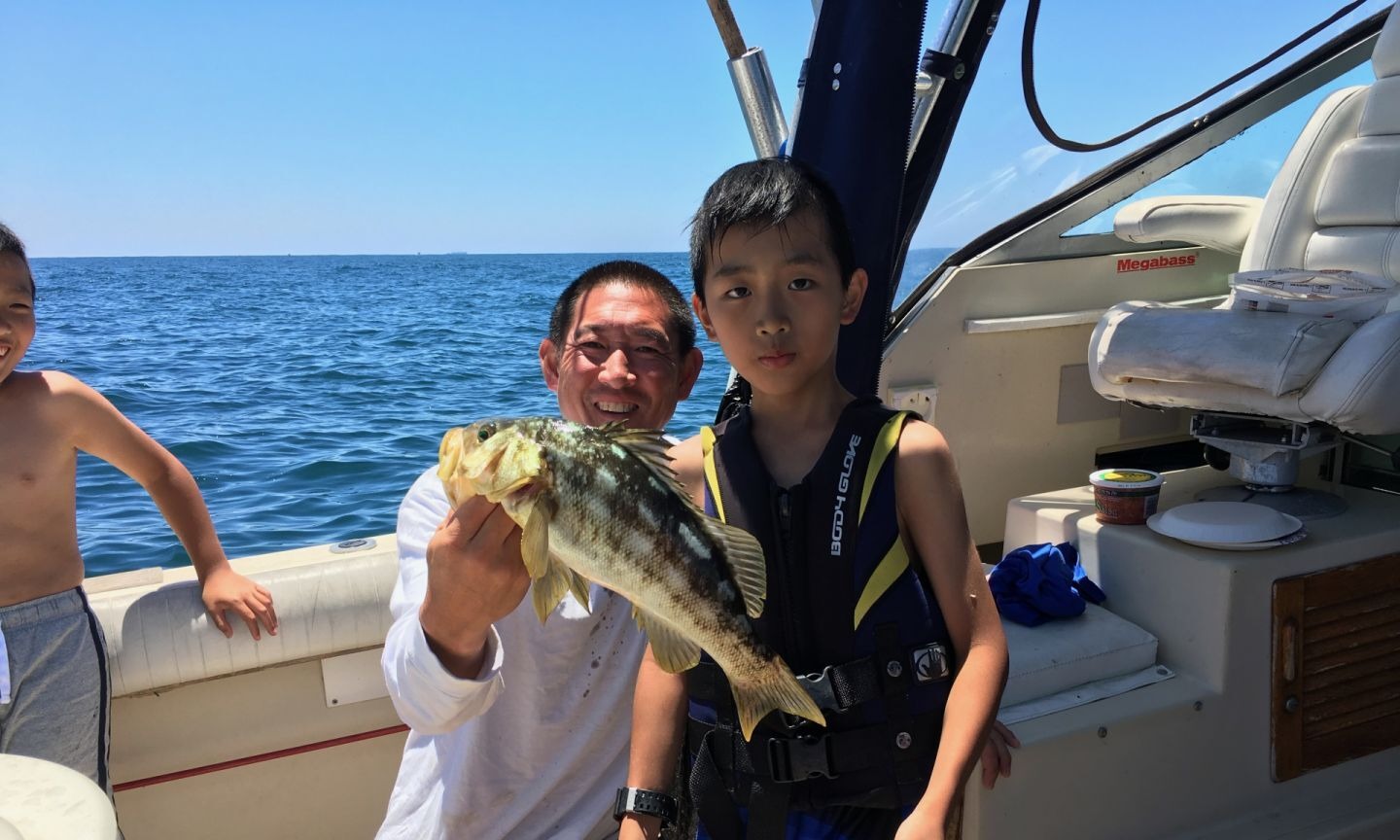 A couple enjoying a fishing trip in Dana Point