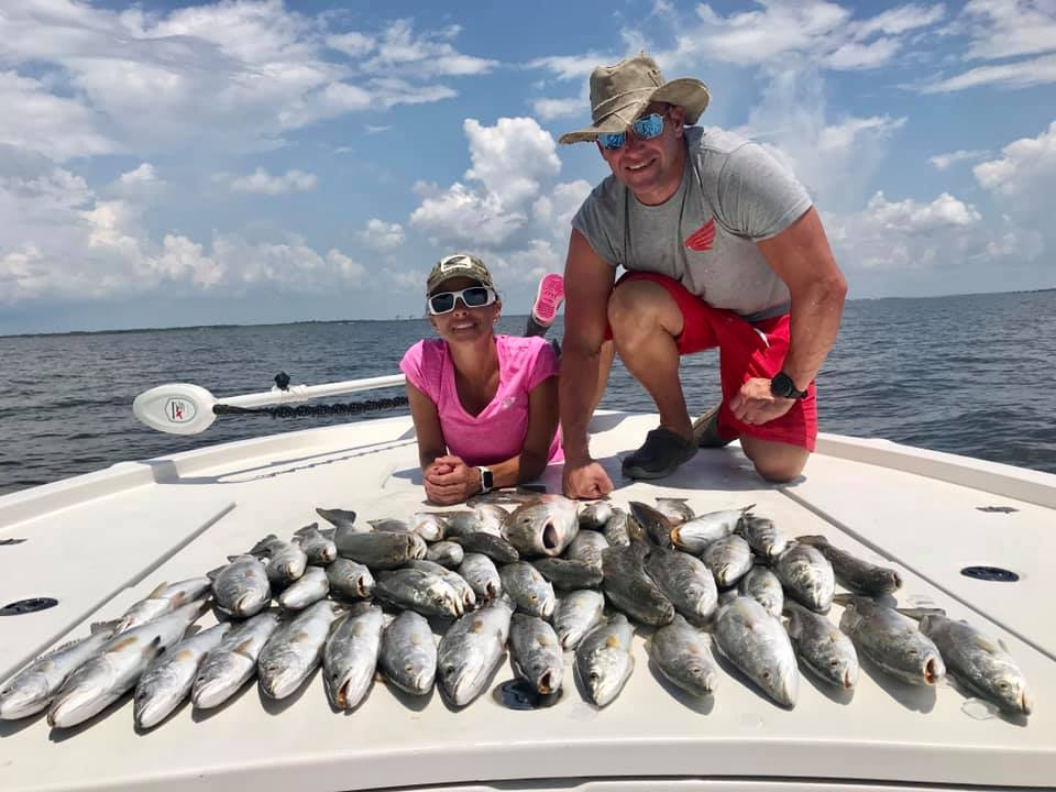 Two people fishing at Lake Charles