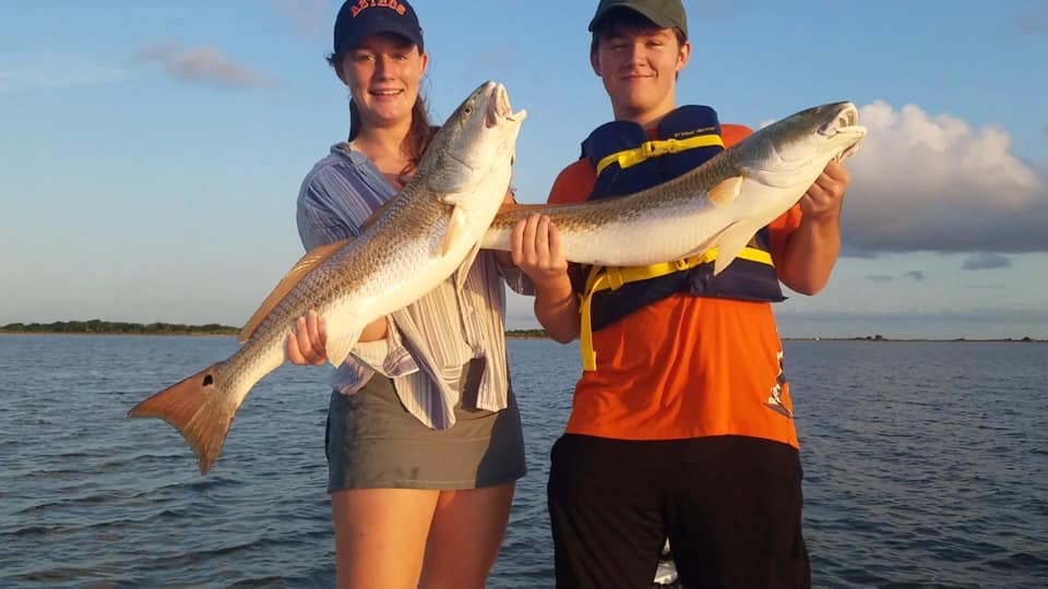 Two people fishing at Lake Charles