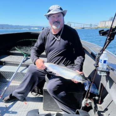 Oregon drift boat fishing charter on scenic river with Alumaweld Guide Model boat
