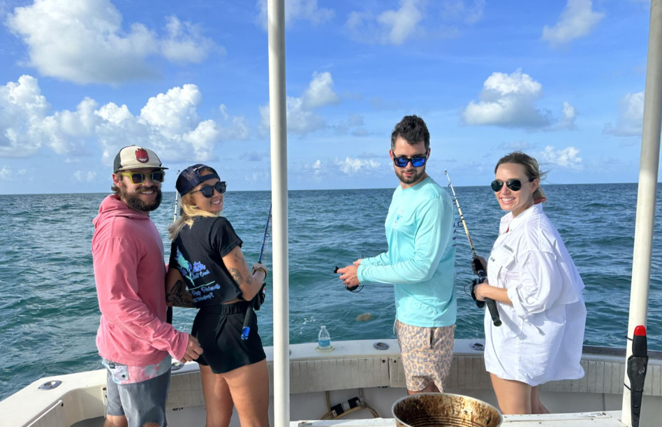 Four people enjoying a fishing trip in Key West