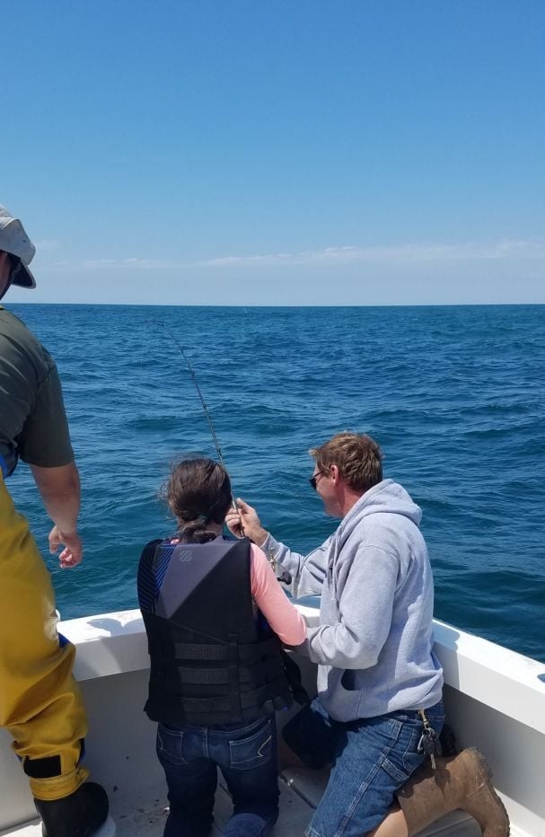 Person fishing in RI