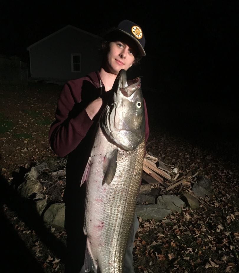 A person fishing in South Kingstown