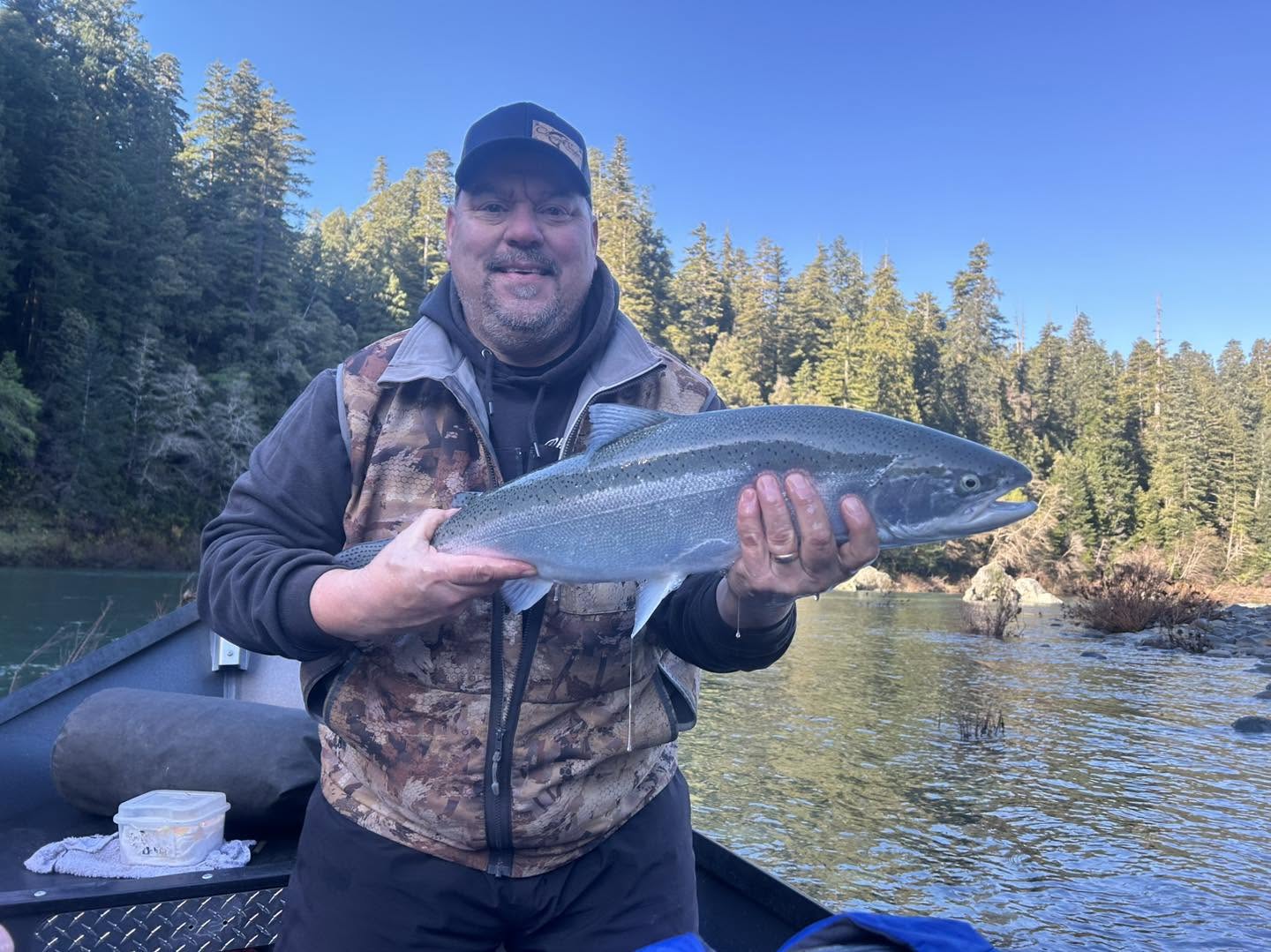 Power boat fishing on Rogue River Oregon targeting salmon and steelhead with guide