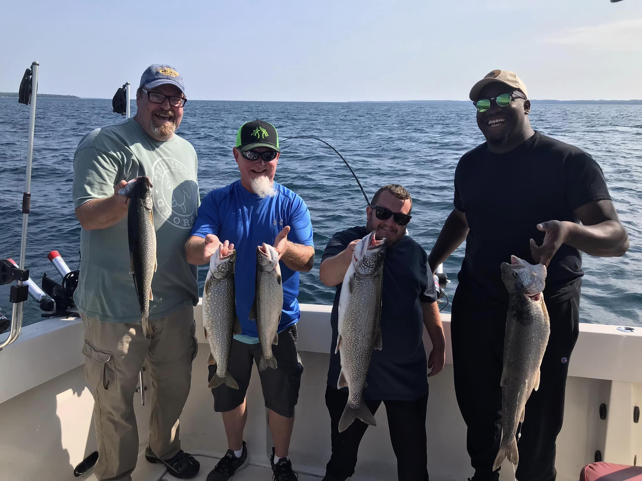 Four lake trout caught on a fishing trip in MI