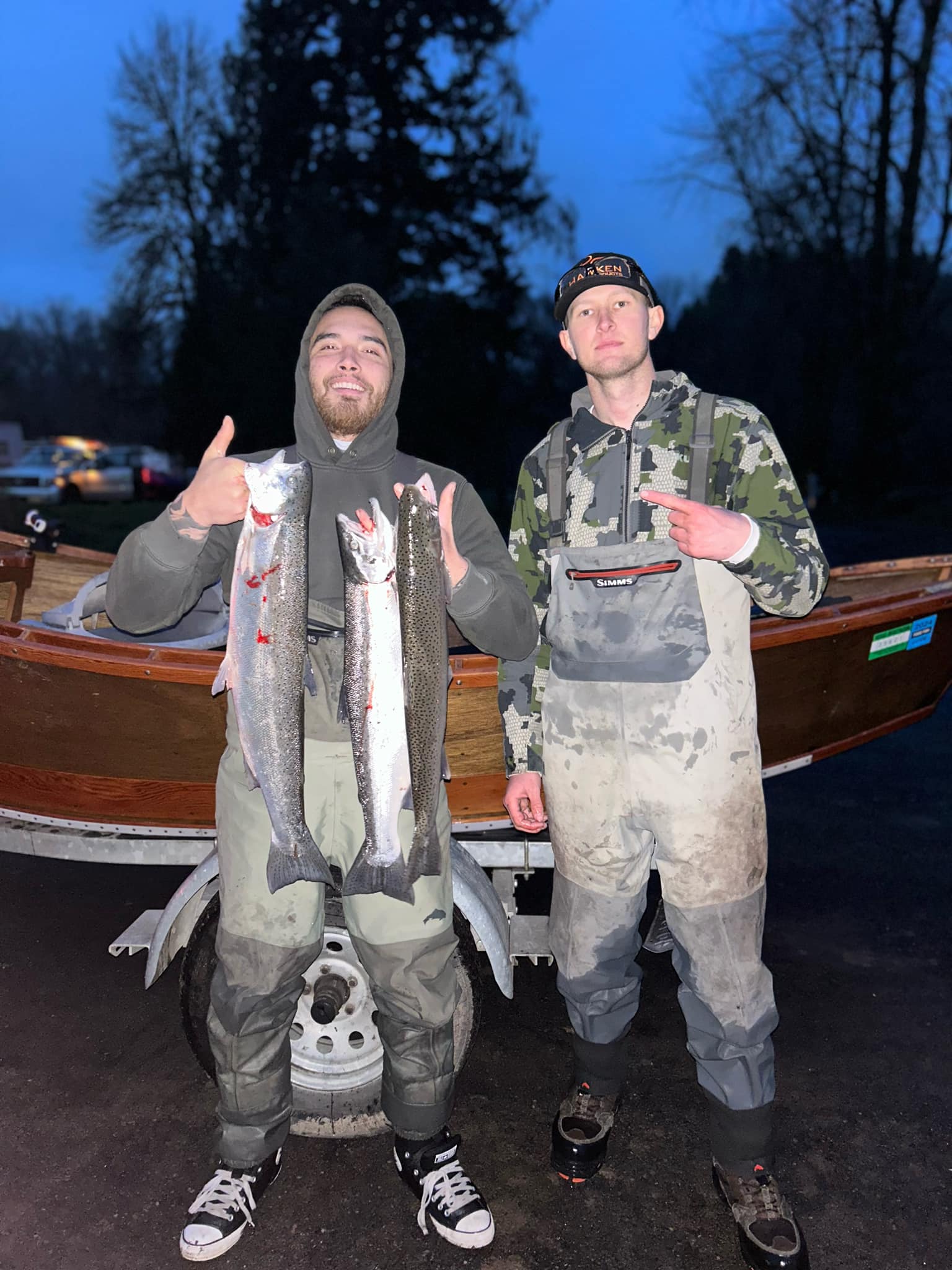 Two anglers with a big 21-inch fish in Kalama