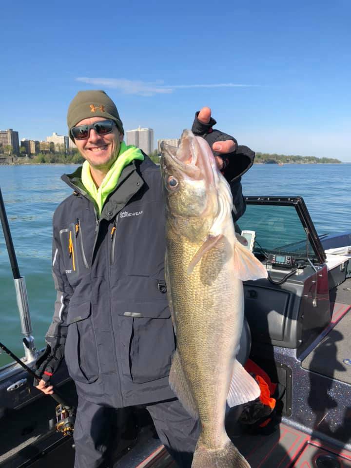 An angler fishing in North Lawrence
