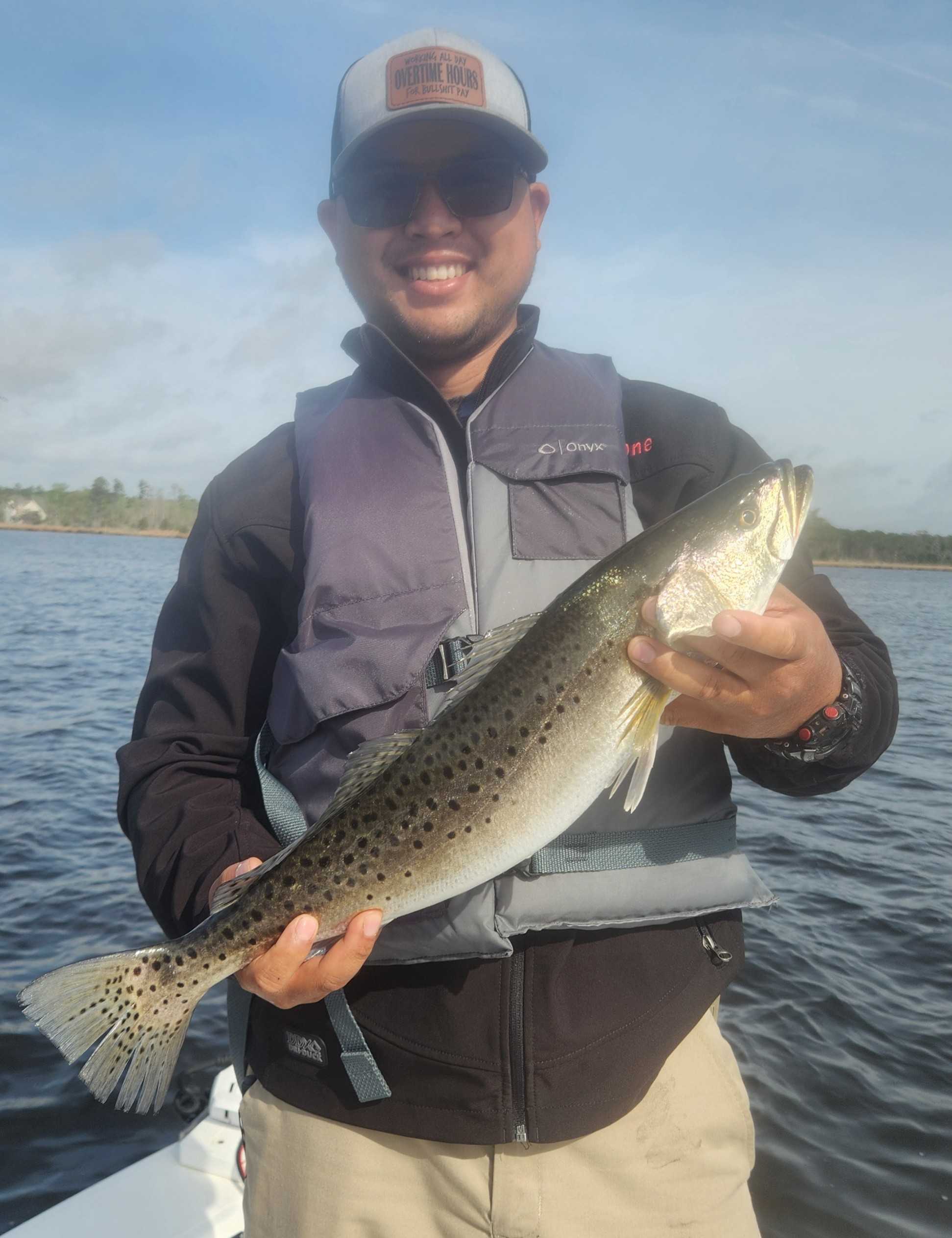 A photo of a single Spotted Weakfish caught while fishing in NC.
