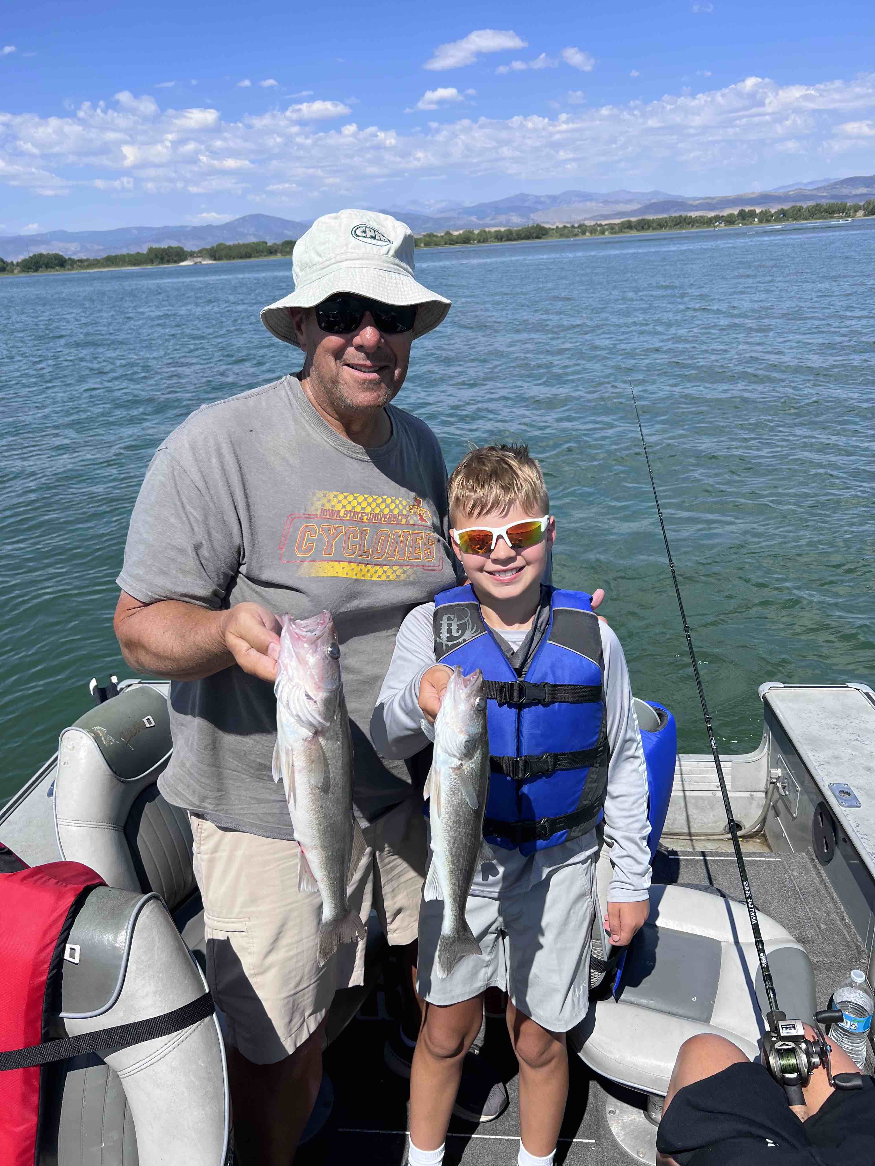 Two anglers fishing for walleye in Loveland