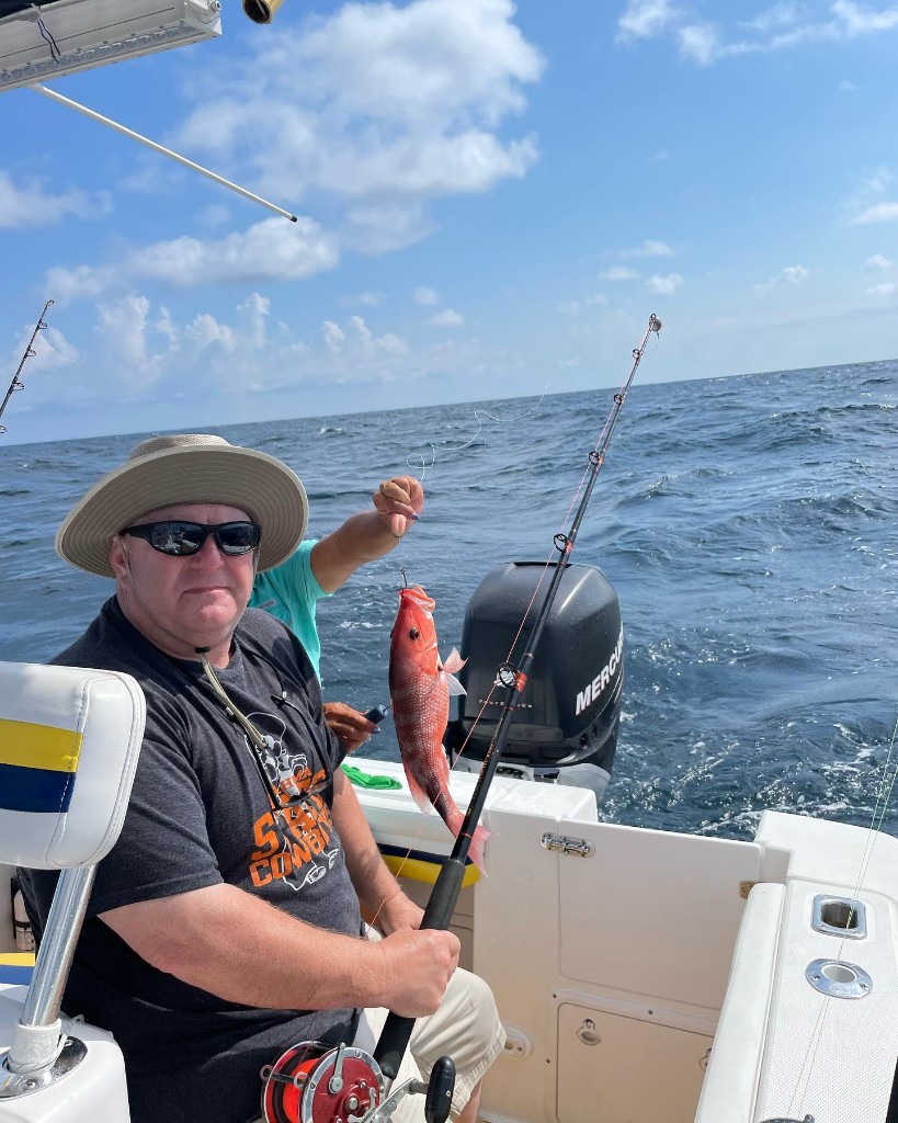Angler with 8-inch fish at Fort Walton Beach