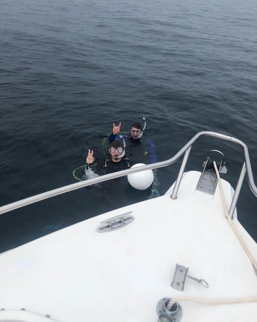 Two anglers enjoying a day of fishing in FL