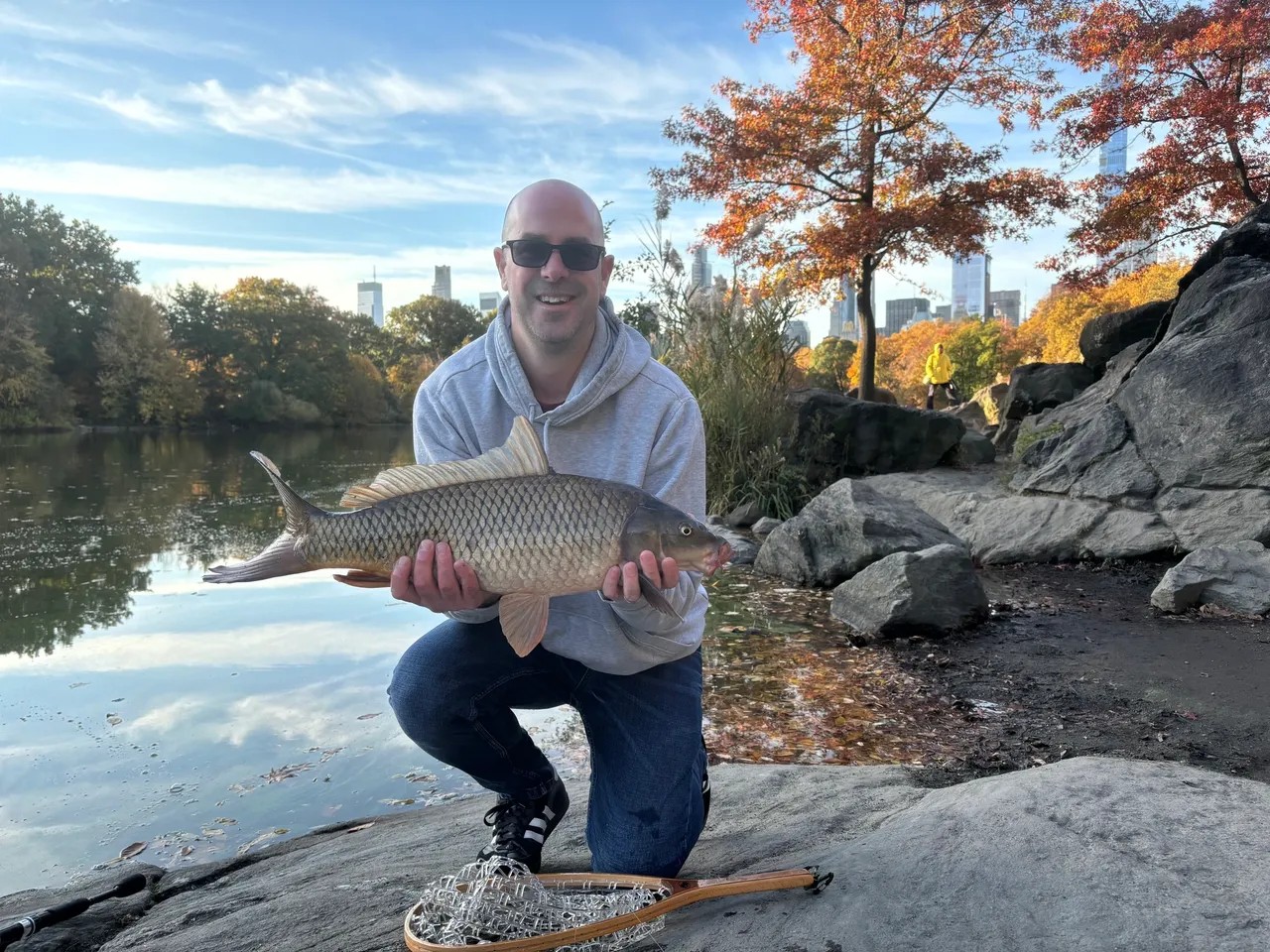 Guided carp fishing at Harlem Meer lake in Central Park, New York with fishing gear provided