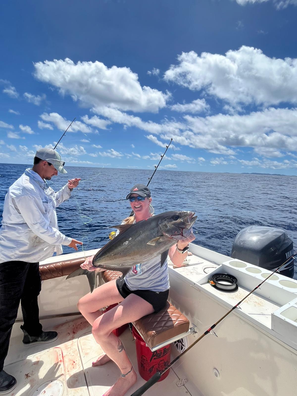 A photo of two people fishing in Fajardo