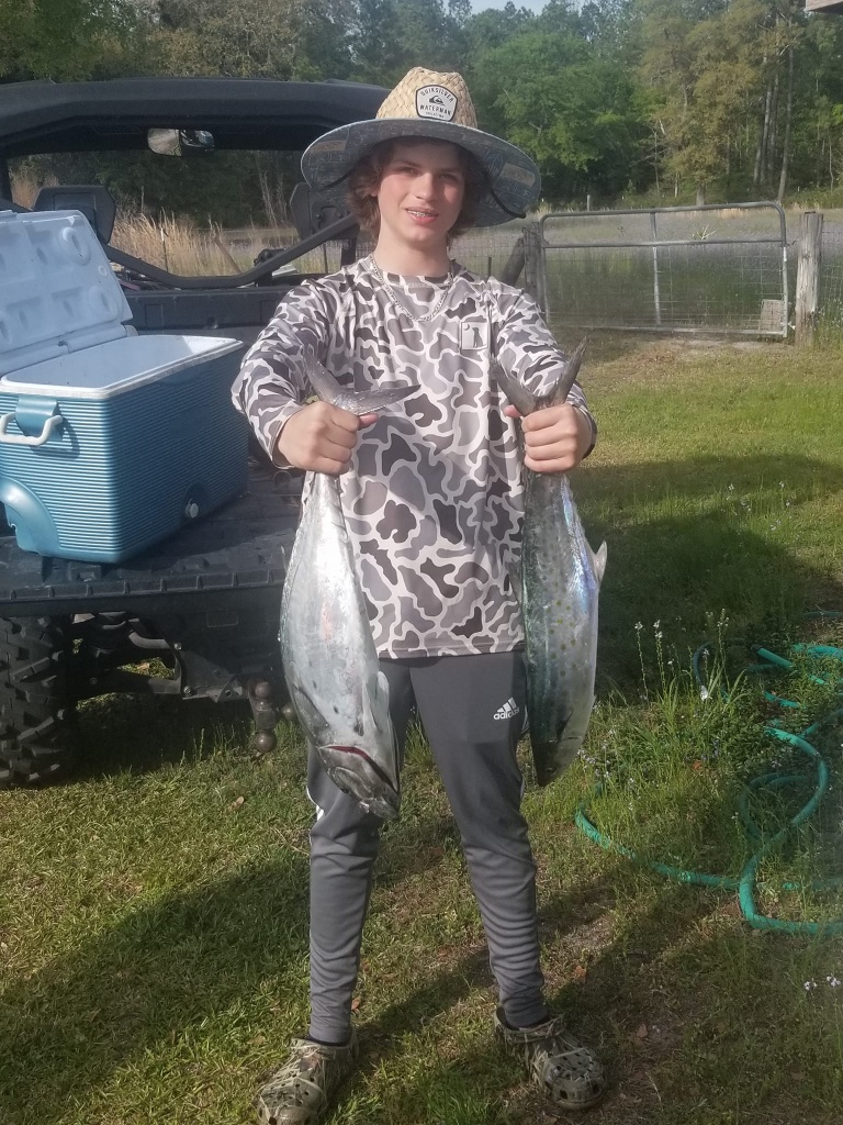 2 fishermen with their catch in South Carolina
