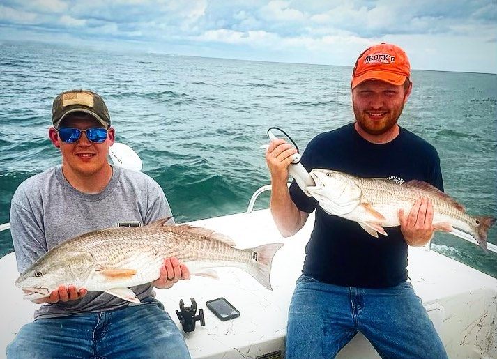 Two anglers enjoying a day at Wrightsville Beach