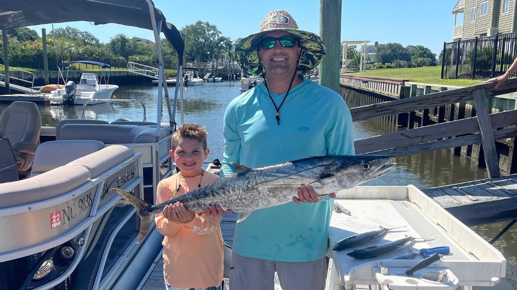 Two anglers with a big 42-inch fish in North Carolina