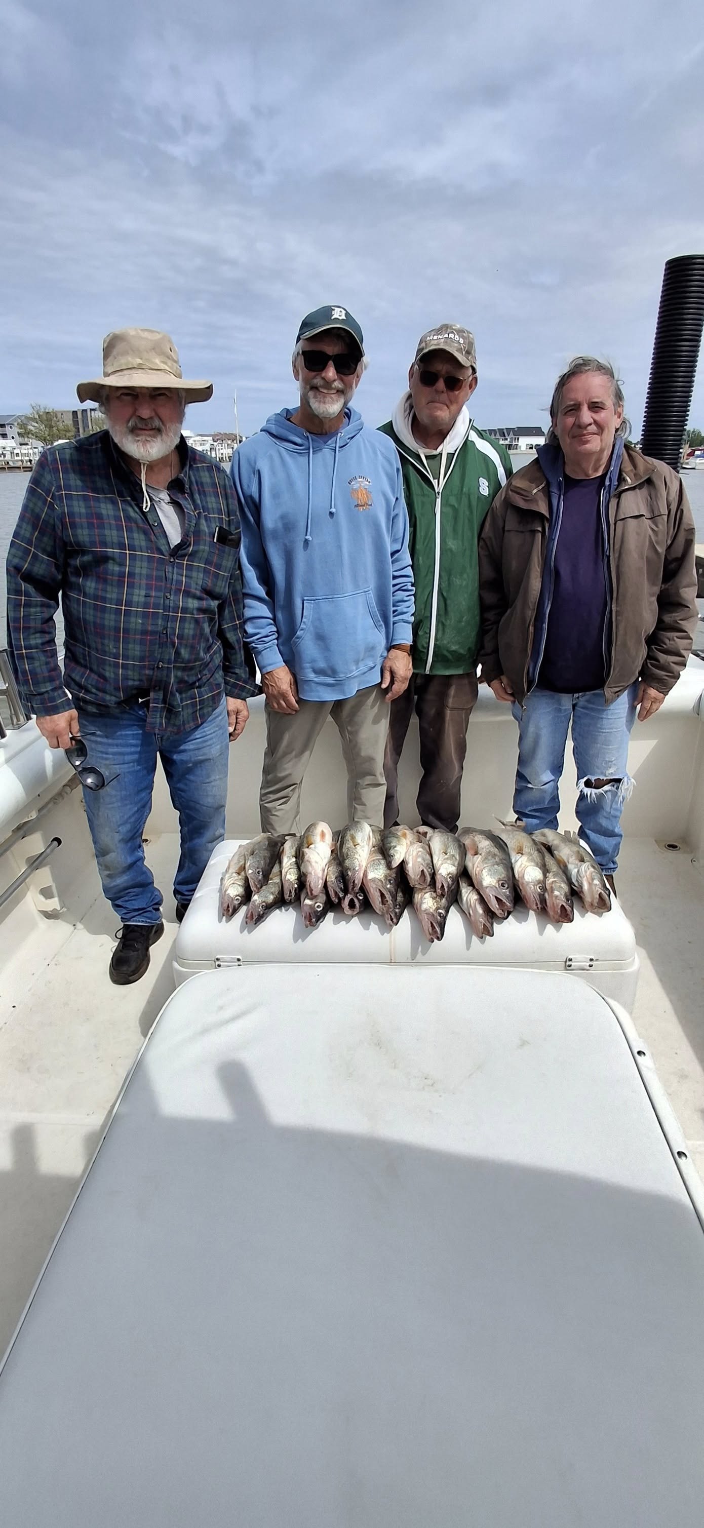 Successful fishing trip in Port Clinton OH with fresh catch displayed on boat deck