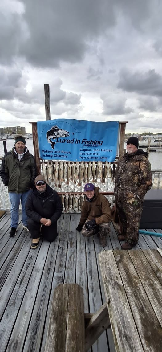 Fishing charter catch display with walleye and perch hung on rack at Port Clinton OH dock
