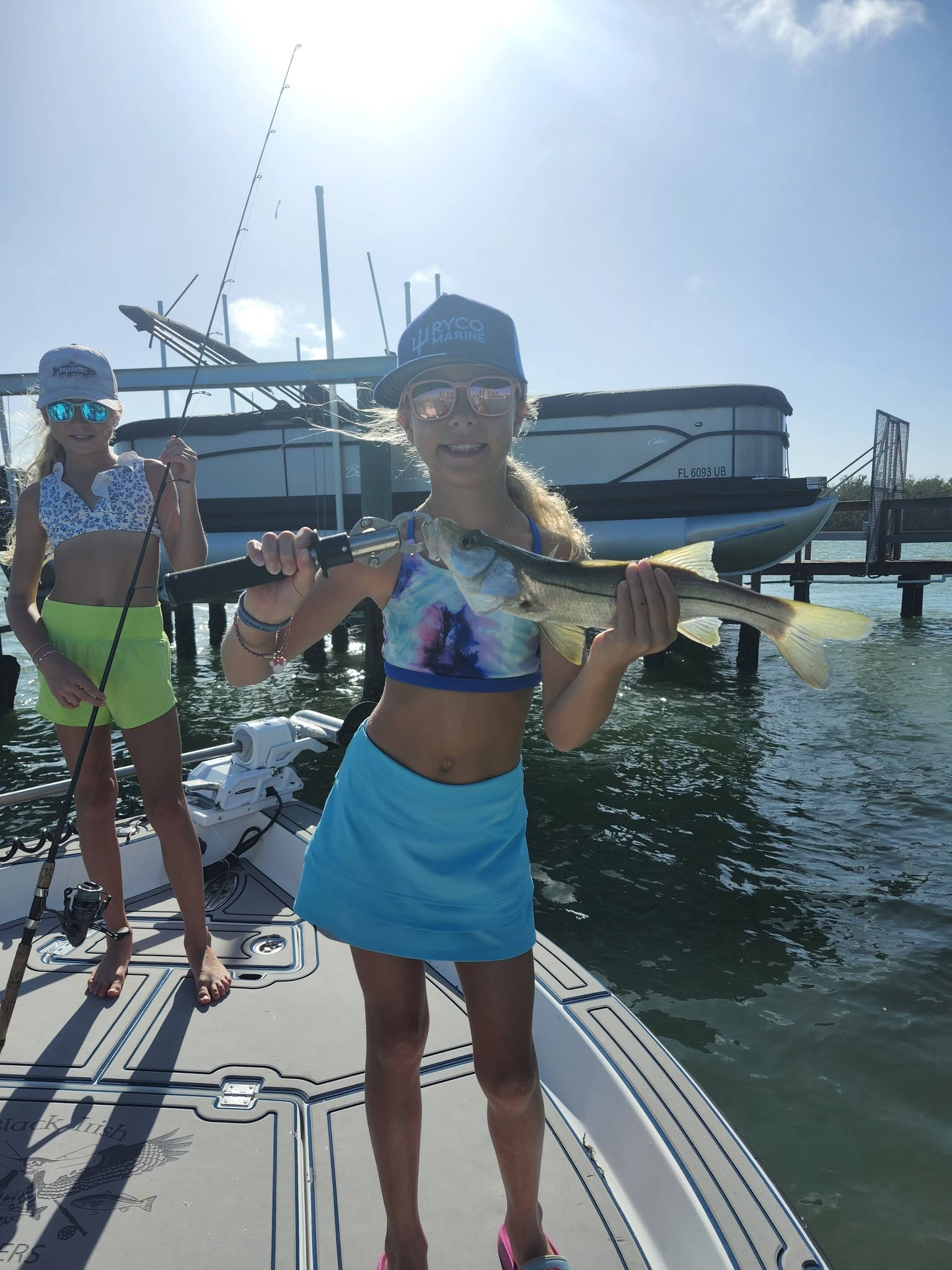 Snook catch displayed on fishing boat in Bonita Springs FL marina