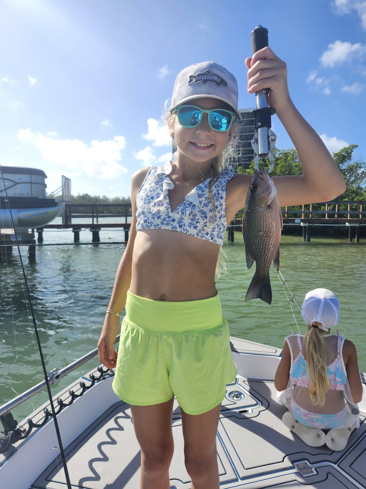 Grey snapper caught fishing in Bonita Springs FL displayed on boat deck