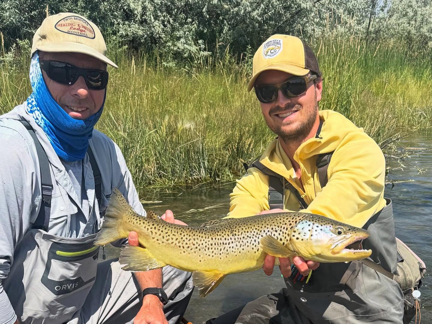 Guide wade fishing for trout in river with angler, 4-hour guided fishing trip