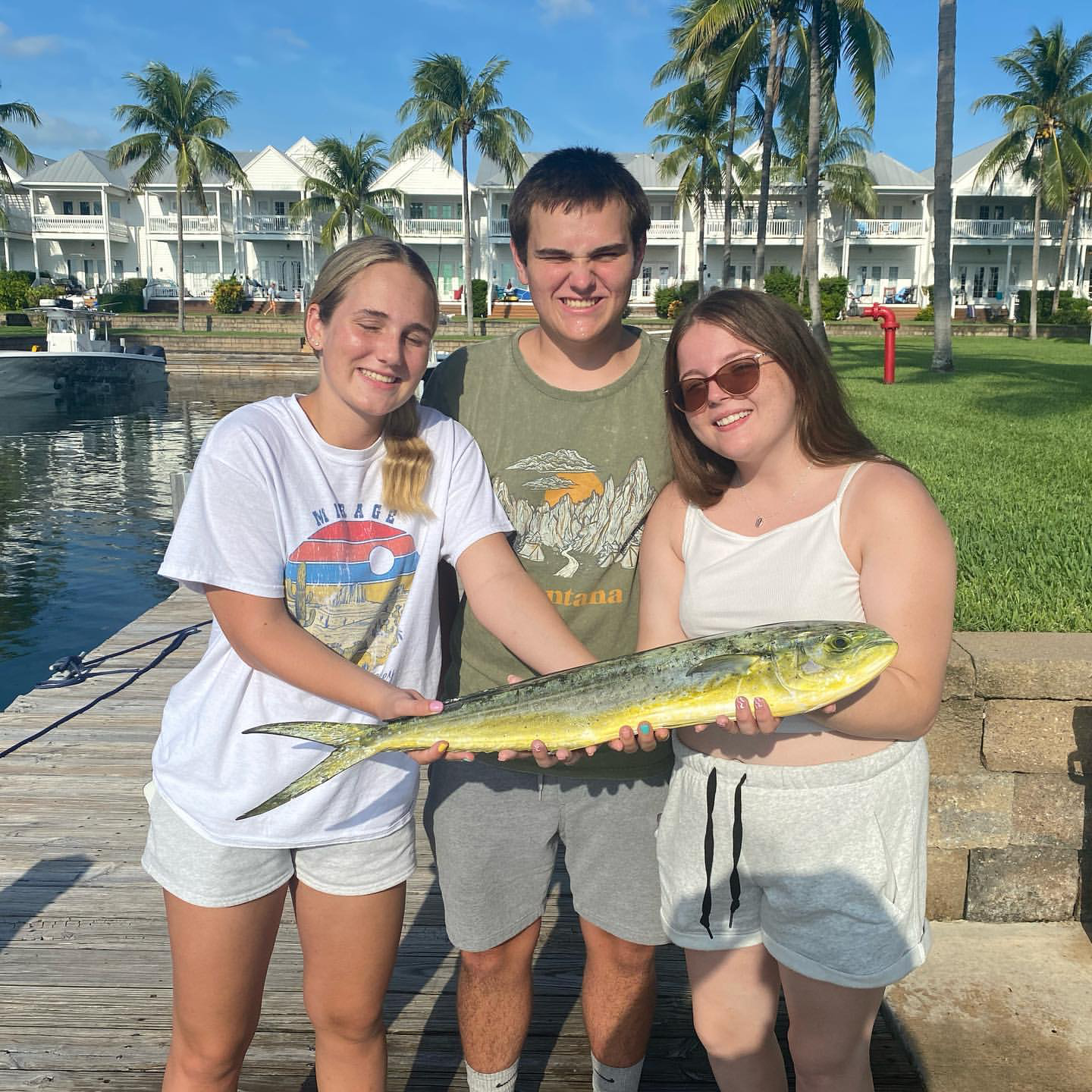 Three people fishing in the waters of Tierra Verde
