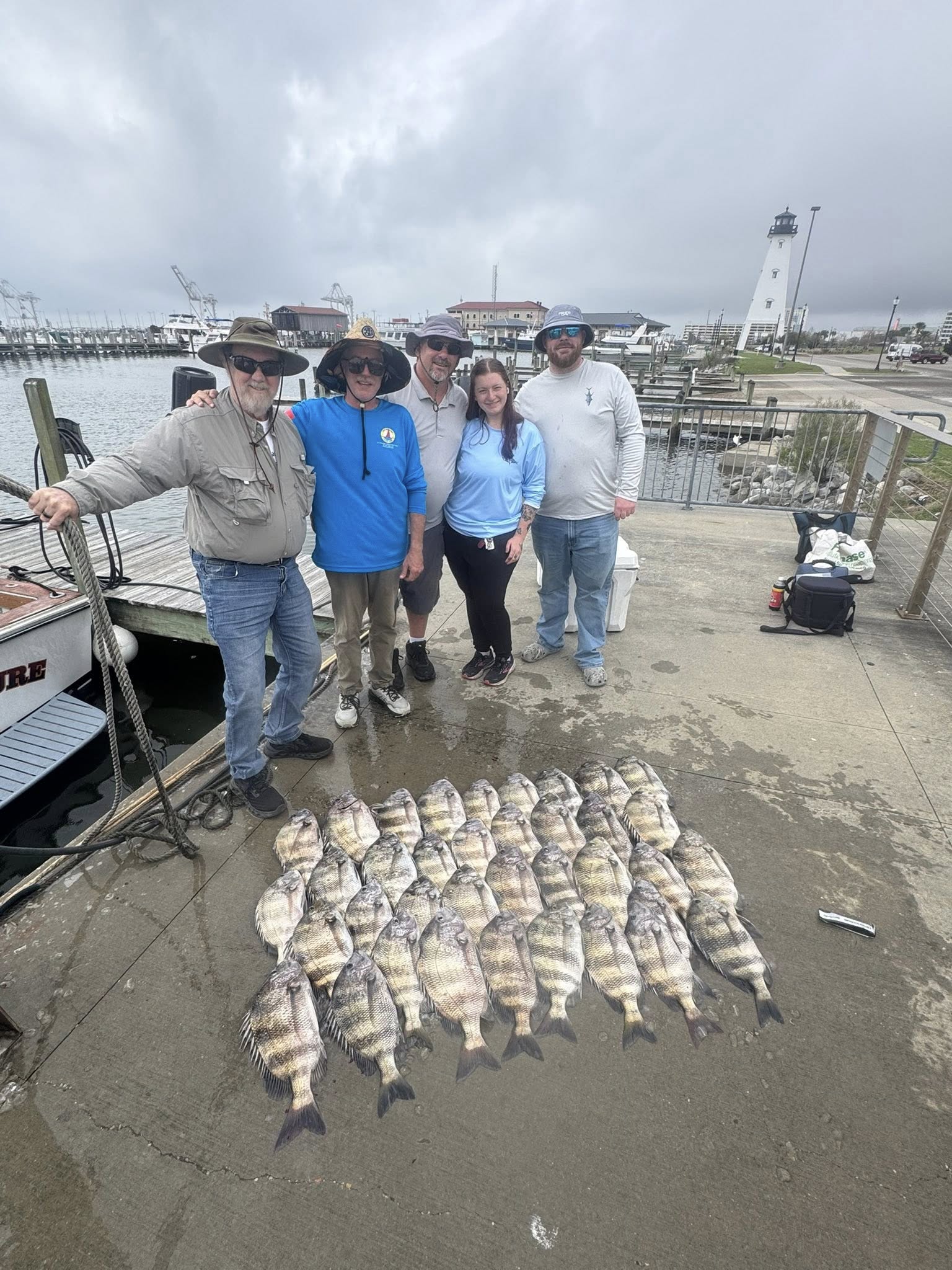 Large catch of sheepshead fish displayed on dock at Gulfport MS marina