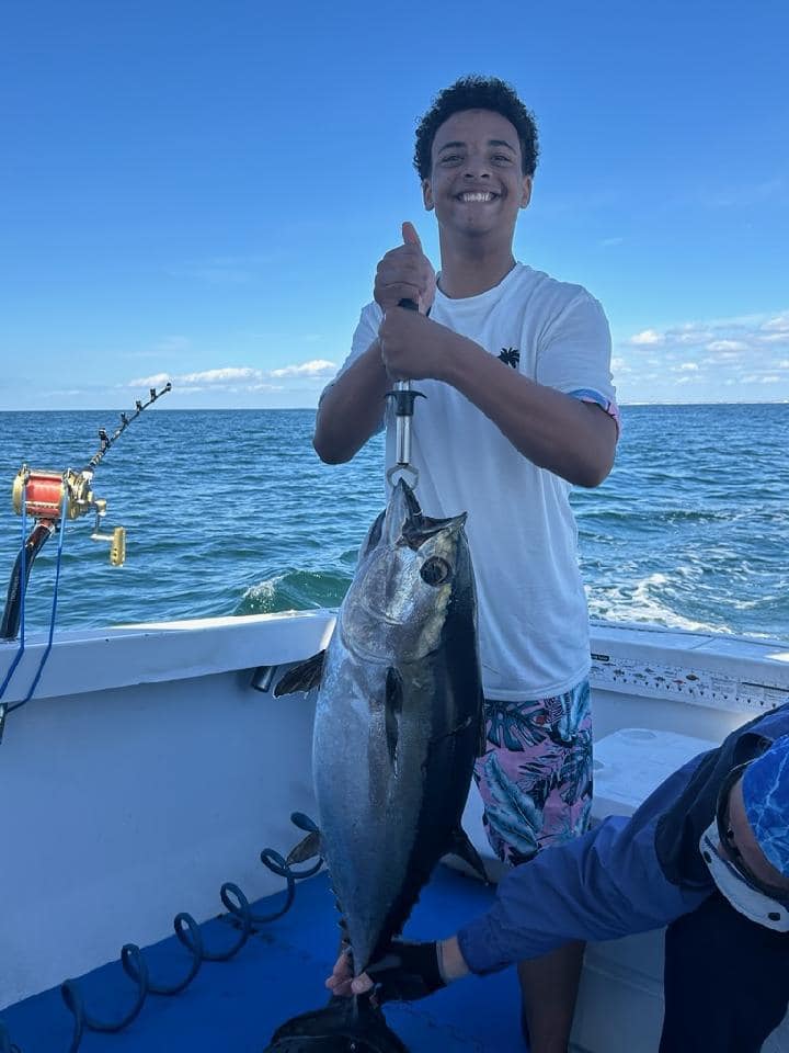 Angler reeling in a 21-inch fish in FL