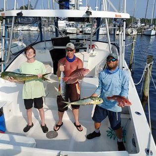 Two anglers with their catch of big fish in Florida