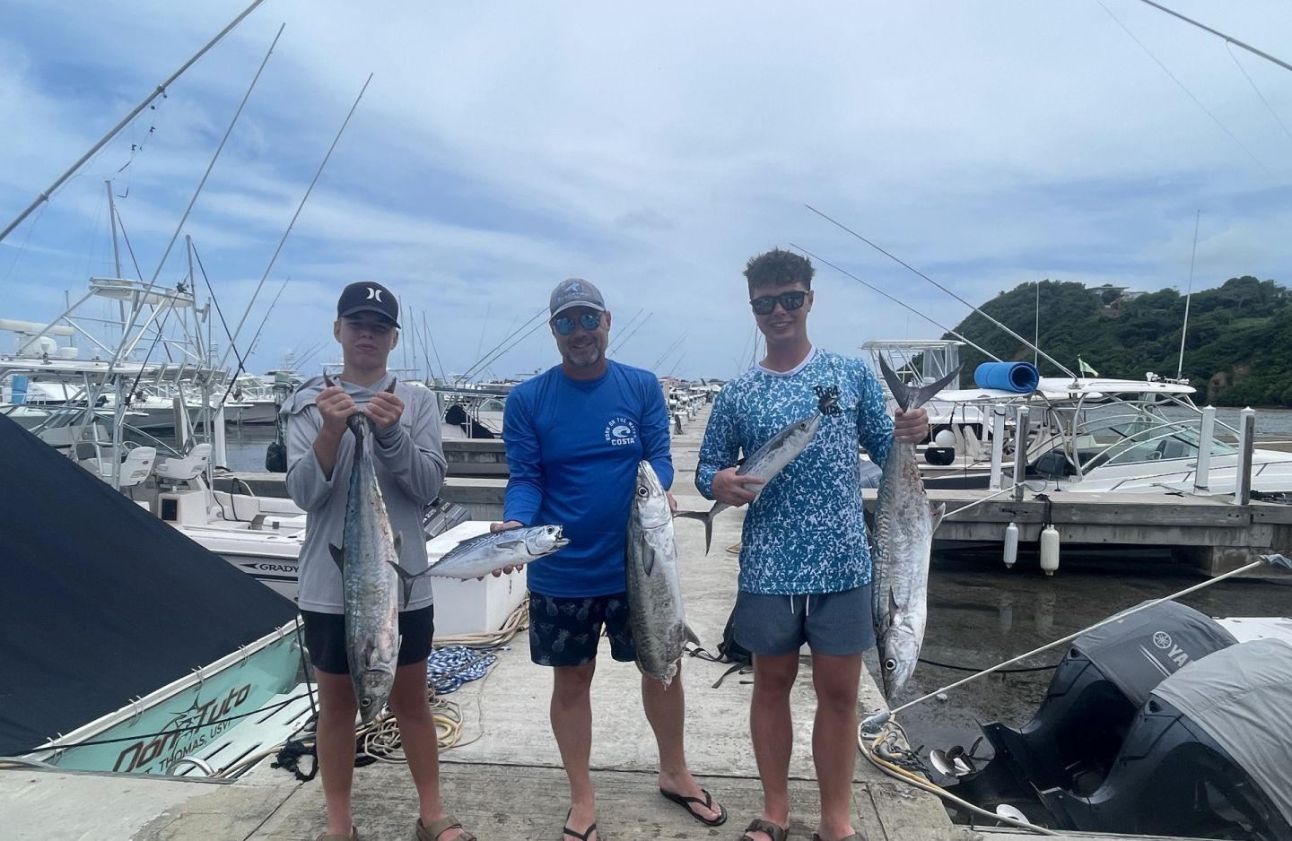 Successful fishing trip in San Juan PR showing King Mackerel and Little Tunny catch at marina dock