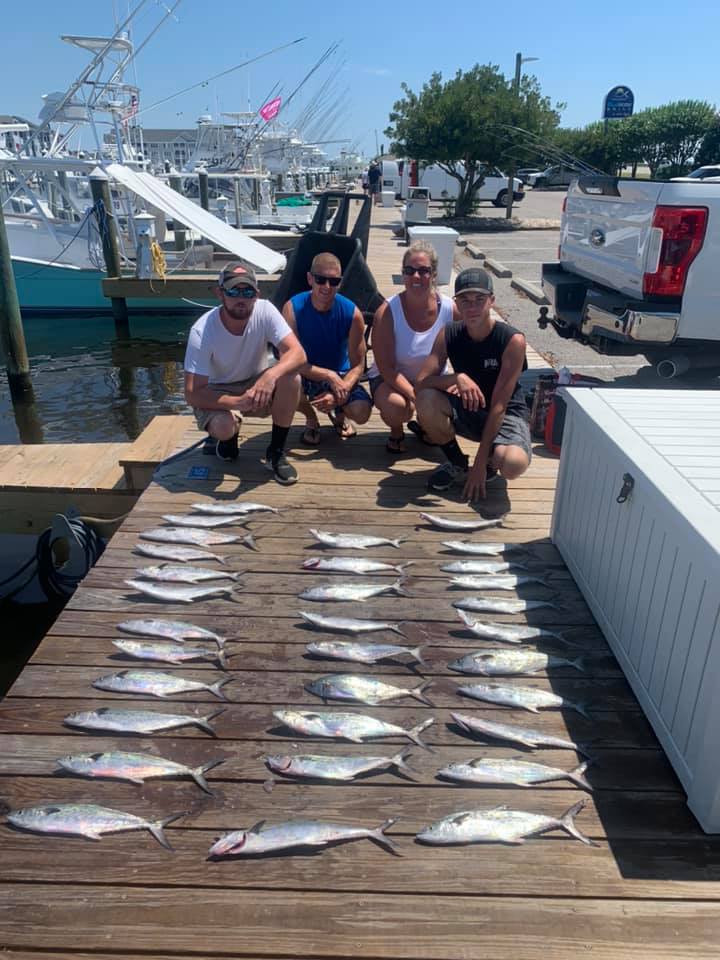 Anglers catching 3 big fish in Manteo