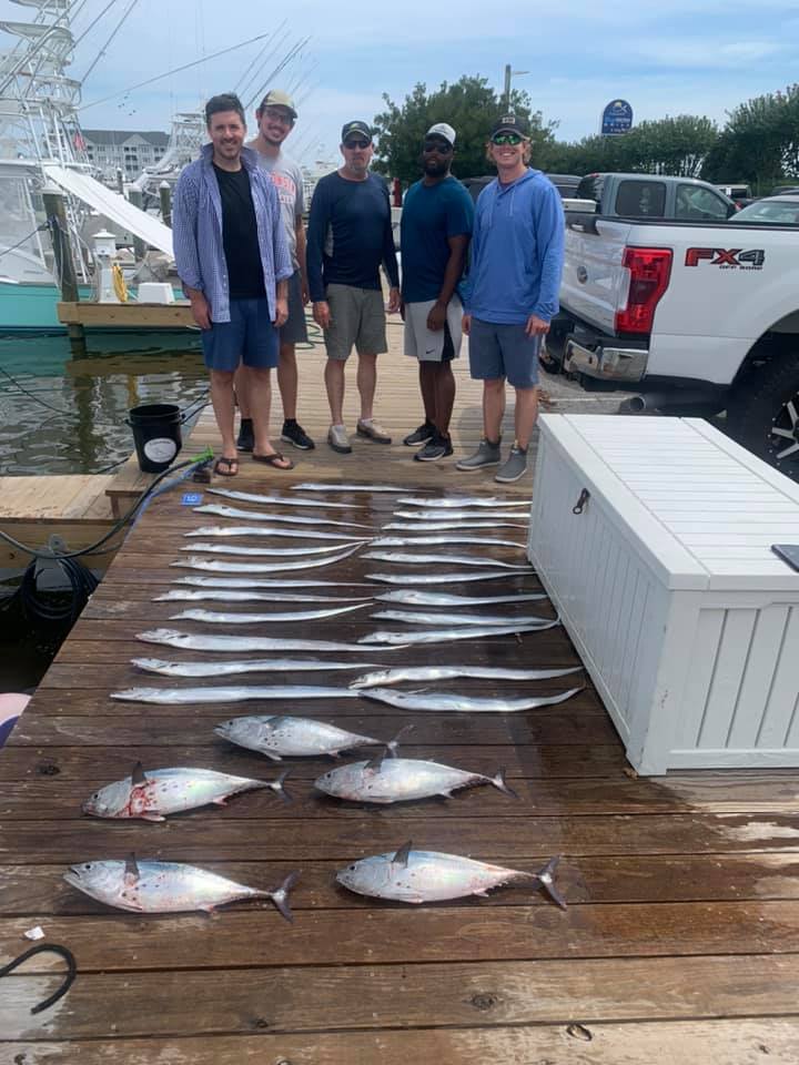 4 large fish caught by 5 people in Manteo