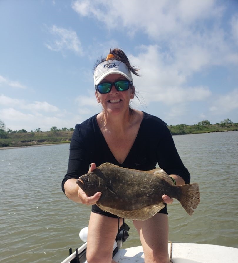 Fishing for a summer flounder on TX lake