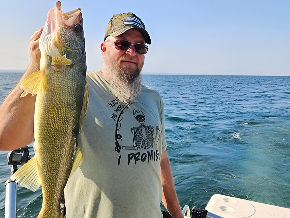 Lake Erie walleye fishing charter boat trolling for fish on weekend morning trip