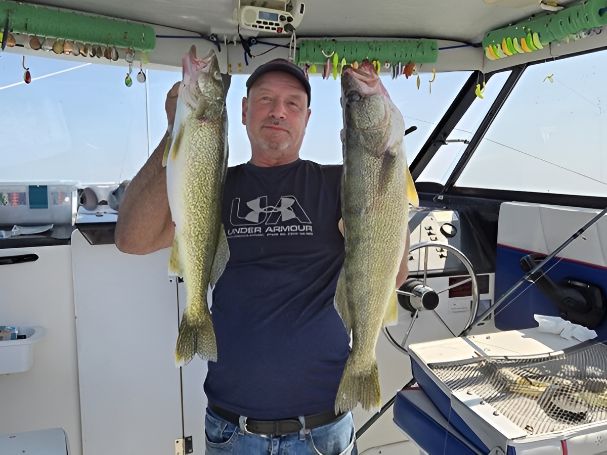 Lake Erie walleye fishing boat at sunrise with fishing rods and tackle ready for charter