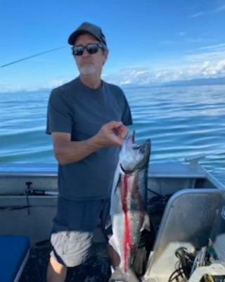 A big fish caught by an angler in the scenic Campbell River