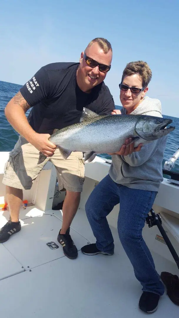 Chinook salmon caught by two people in Wolcott