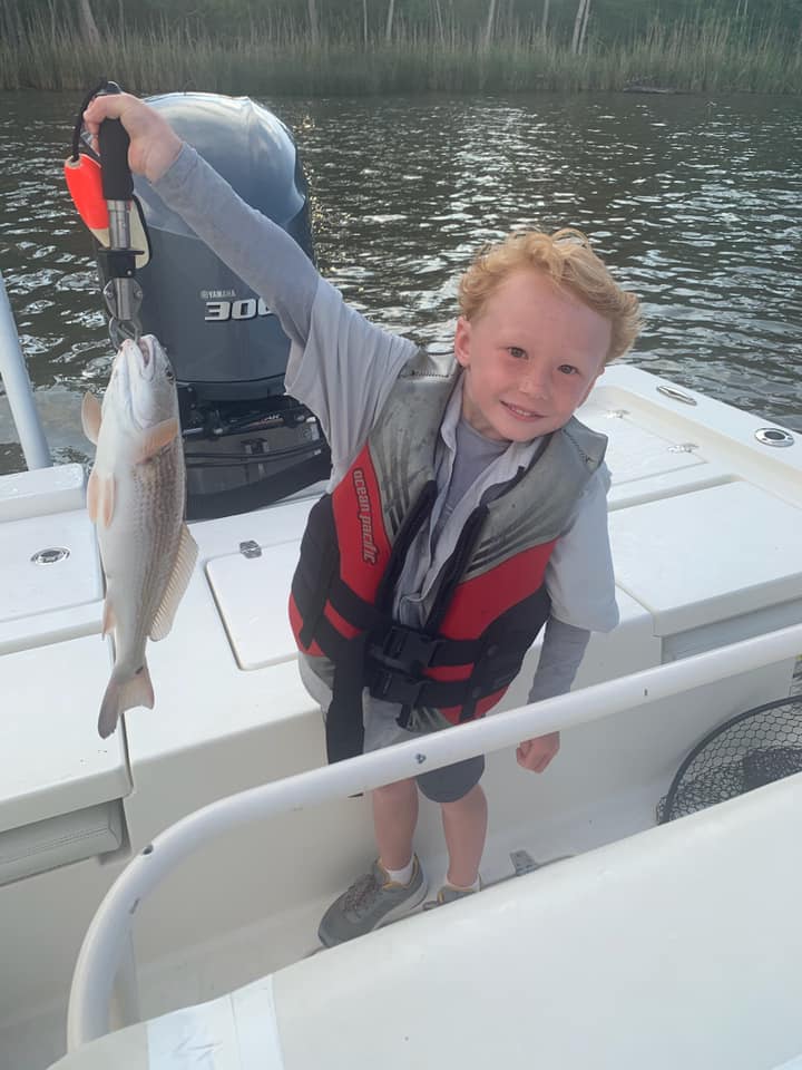 Impressive catch of an Atlantic Croaker fish in Fairhope