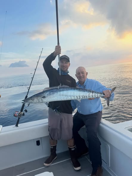 Successful wahoo fishing trip in Tavernier FL with large catch displayed on boat