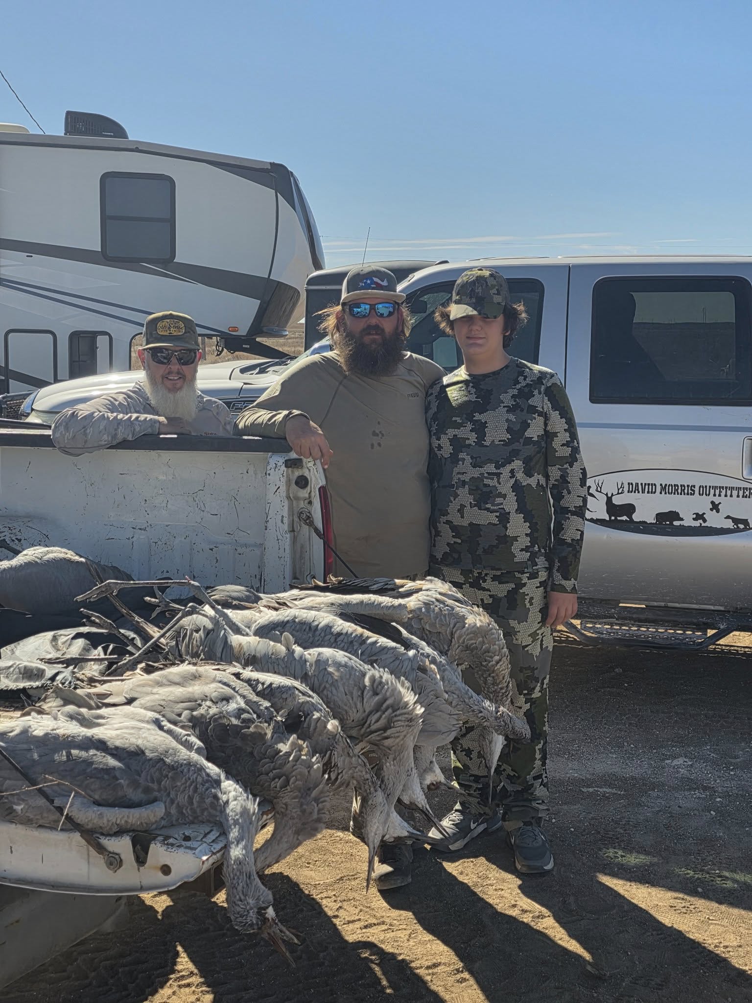 Successful hunting trip in Alba TX with harvested game birds in truck bed