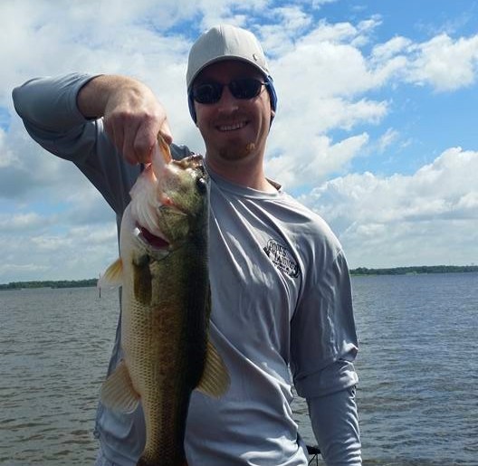 Lake Fork bass fishing guide with anglers on 2025 Nitro boat during afternoon trophy fishing trip