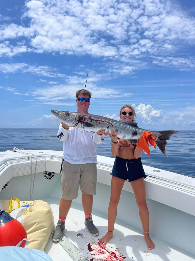 2 people enjoying a day of fishing in FL